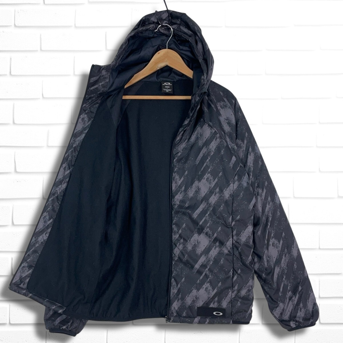 良品 OAKLEY オークリー 裏起毛 中綿 総柄 パーカー ジャケット 良品 OAKLEY オークリー 裏起毛 中綿 総柄 パーカー ジャケット
