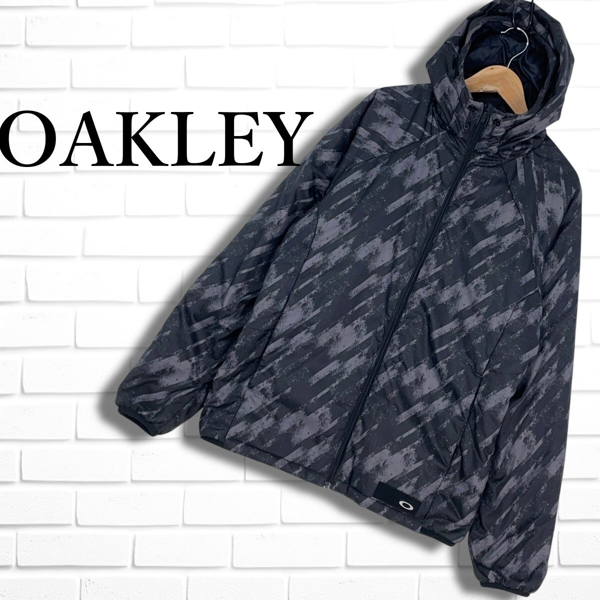 良品 OAKLEY オークリー 裏起毛 中綿 総柄 パーカー ジャケット 良品 OAKLEY オークリー 裏起毛 中綿 総柄 パーカー ジャケット