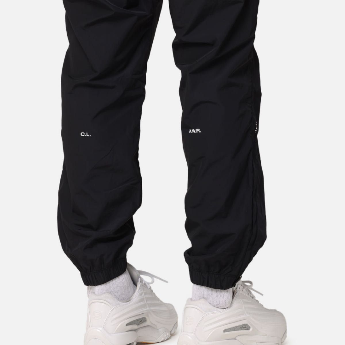 M】Nike Nocta ナイキ ノクタ ナイロン トラックパンツ 黒 新品 M】Nike Nocta ナイキ ノクタ ナイロン トラックパンツ 黒 新品