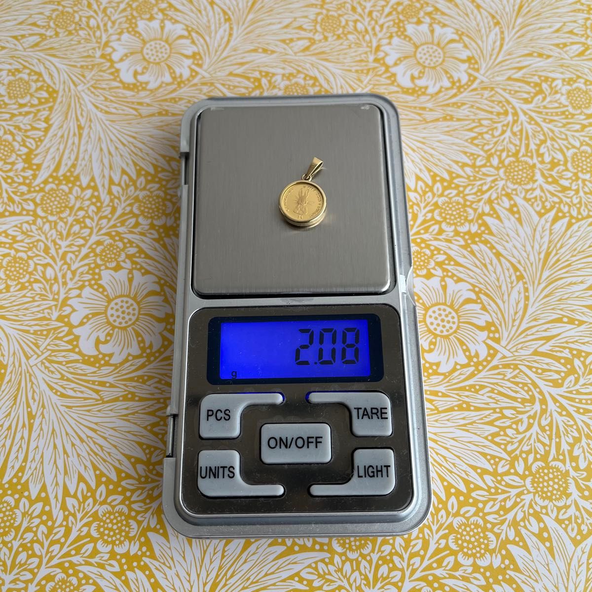 未使用 純金コインペンダント 1/30oz ピーターラビット 120周年 未使用 純金コインペンダント 1/30oz ピーターラビット 120周年