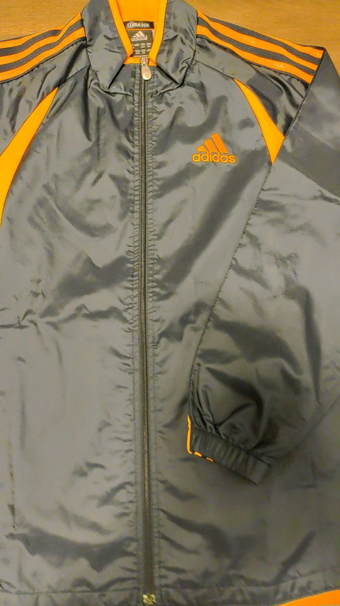 adidas ポリエステルジャケット 黒×オレンジ 160サイズ キッズ シャカシャカジャケット ウインドブレーカー