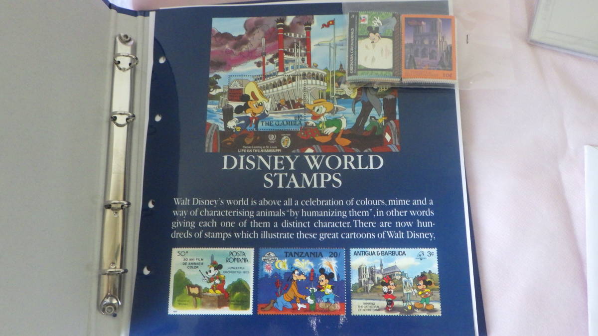WALT DISNEY WORLD STAMPS ディズニー　切手　セット　台紙20ページ　切手が約120枚_中の表紙