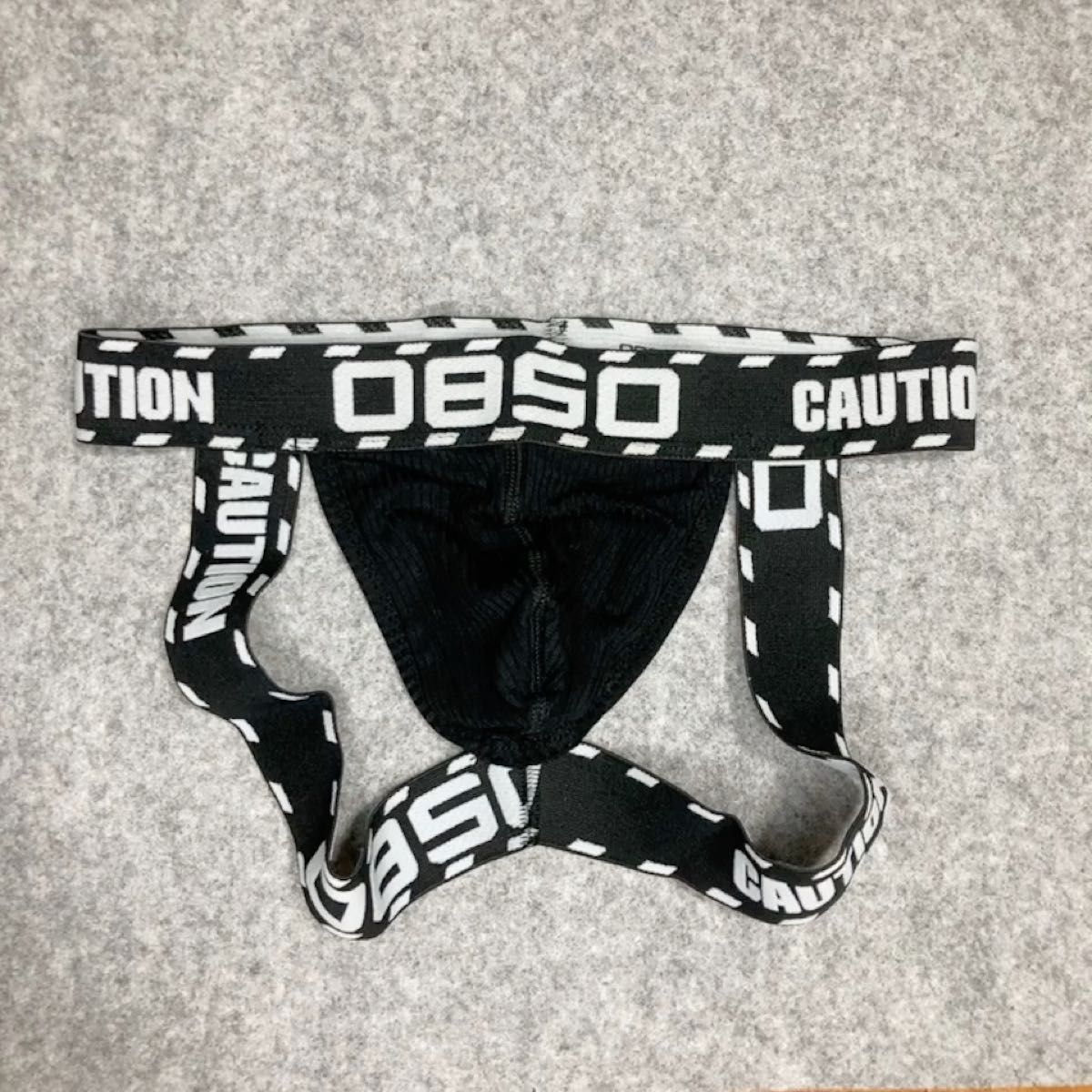 【0850】ジョックストラップ(ケツワレ)ブラック 黒 CAUTION 立ち入り禁止テープ Mサイズ