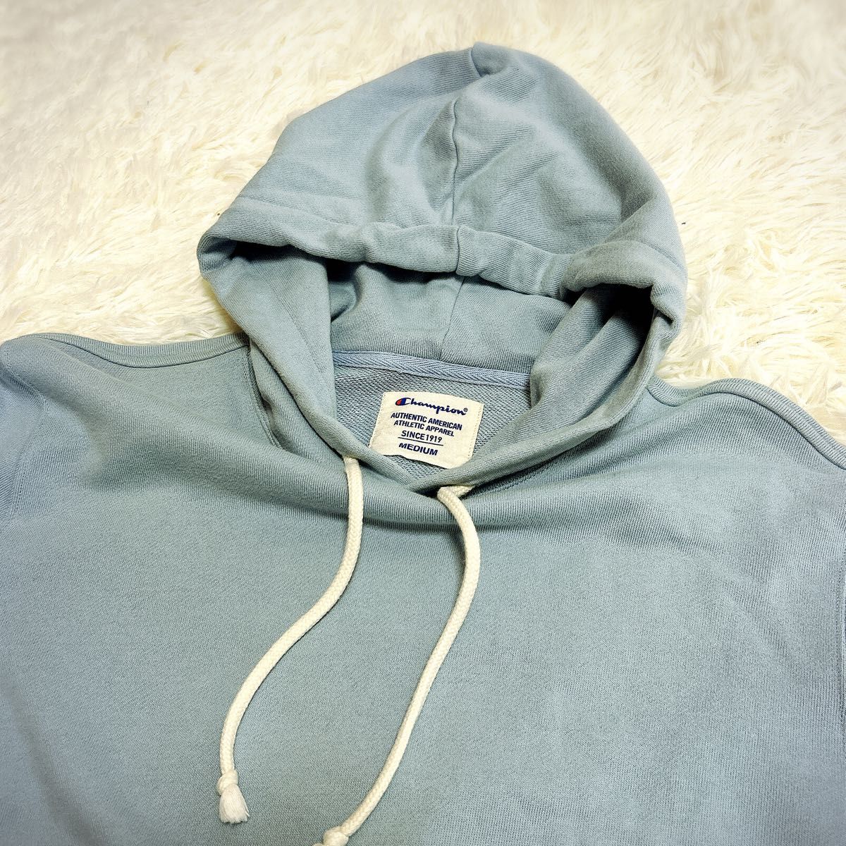 Champion フード付きパーカー サイズM ライトブルー プル Champion フード付きパーカー サイズM ライトブルー プル