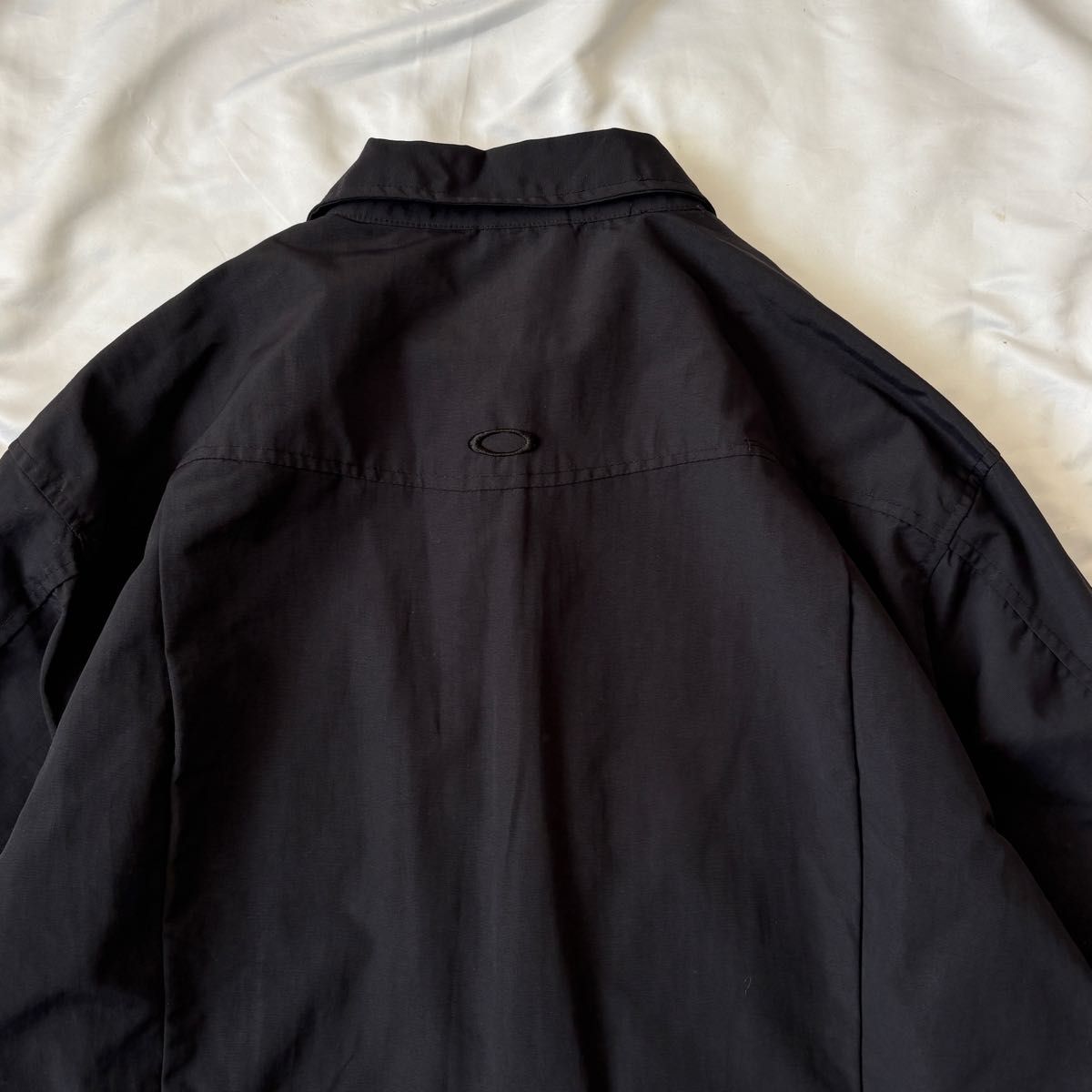 90~00s OAKLEY オークリー ナイロンコーチジャケット メタルロゴ 90~00s OAKLEY オークリー ナイロンコーチジャケット メタルロゴ