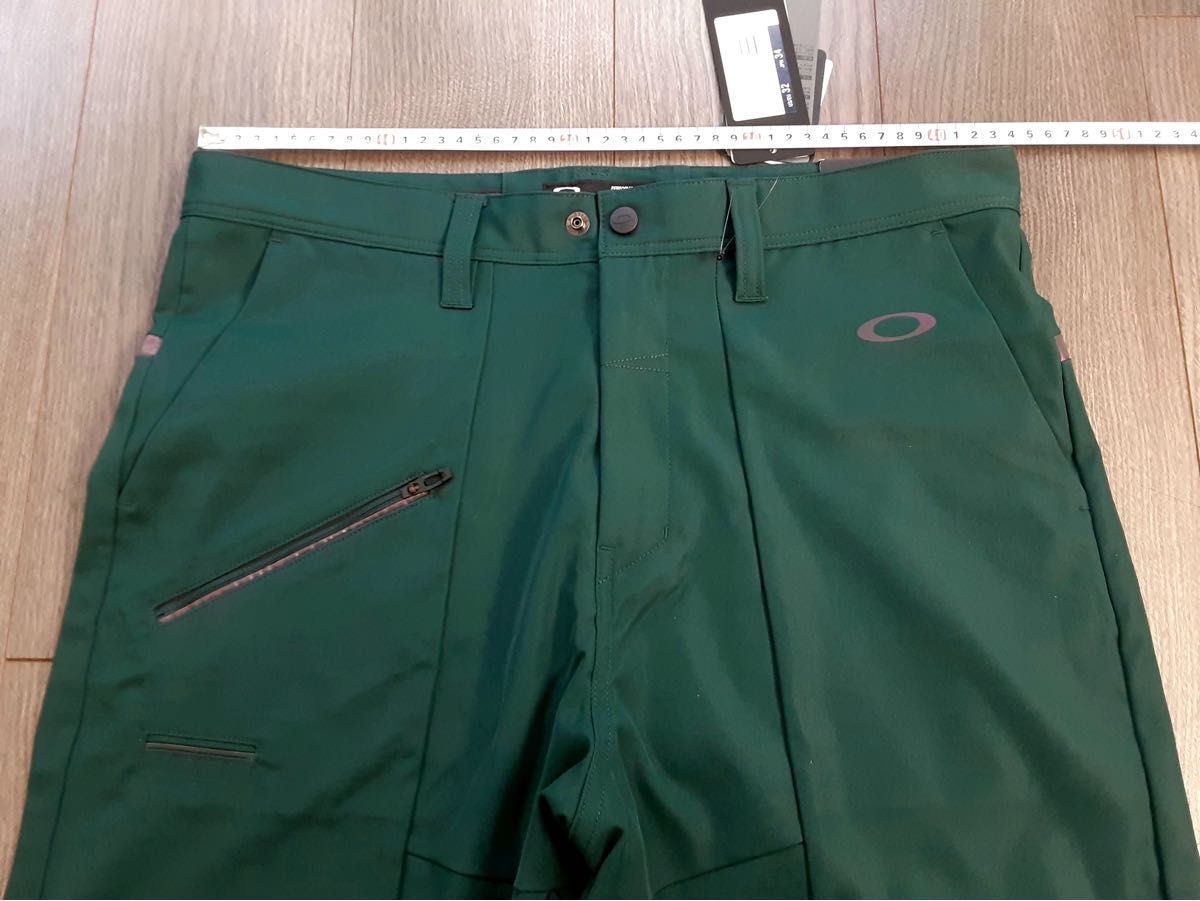 新品 OAKLEY オークリー 7分丈ゴルフパンツ 34 ウエスト86・89調節 新品 OAKLEY オークリー 7分丈ゴルフパンツ メンズ34 ウエスト86
