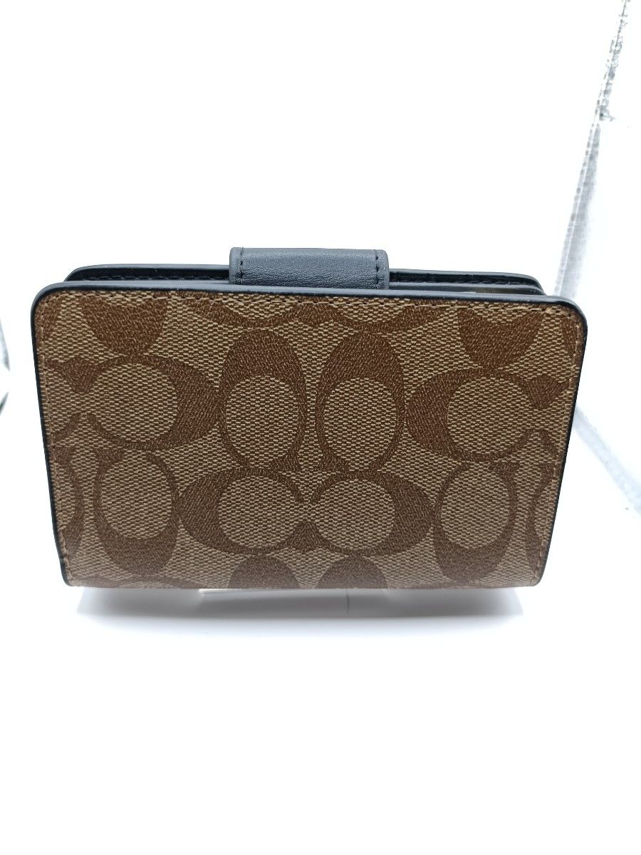 新品 COACH コーチ 二つ折り財布 シグネチャー 黒ボタン 即発送 新品 COACH コーチ 二つ折り財布 シグネチャー 黒ボタン 即発送
