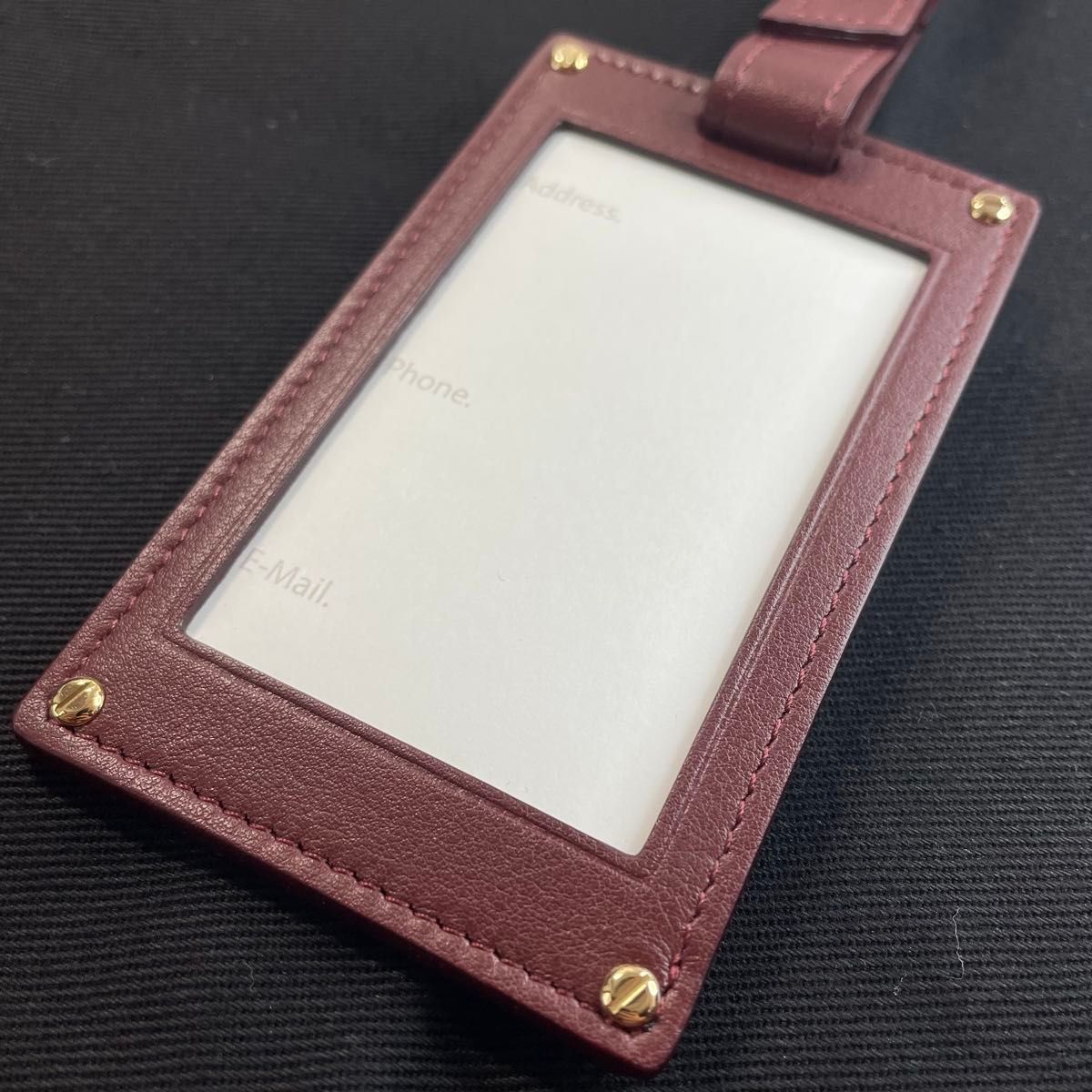 未使用 新品】 カルティエ ネームタグ バッグチャーム ボルドー 未使用 新品】 カルティエ ネームタグ バッグチャーム ボルドー