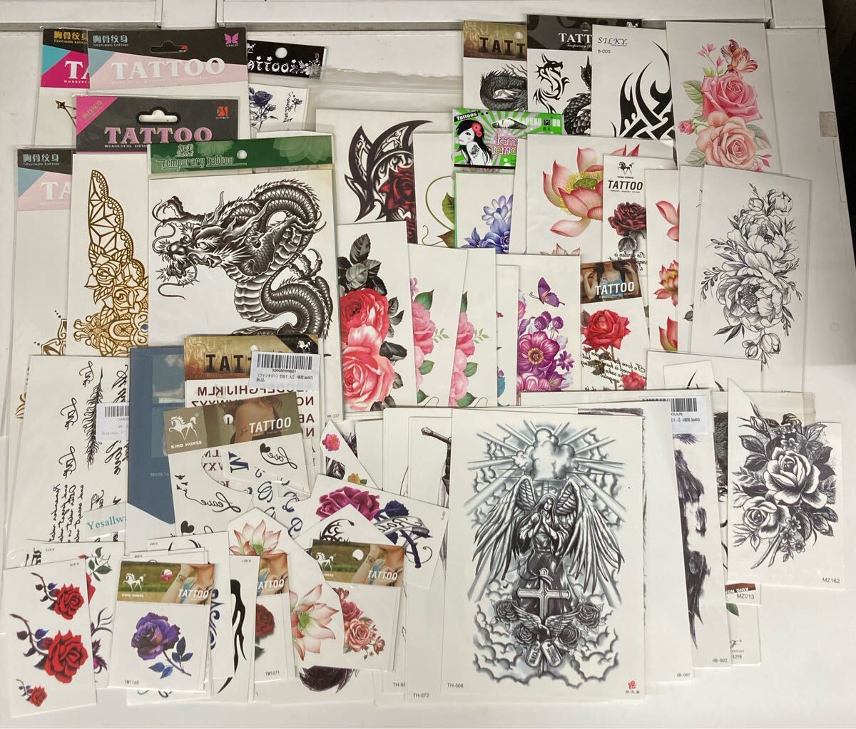 ☆お得/まとめ/セット/新品未使用/タトゥーシール/色々/花/龍/英字/たくさん/ファッション