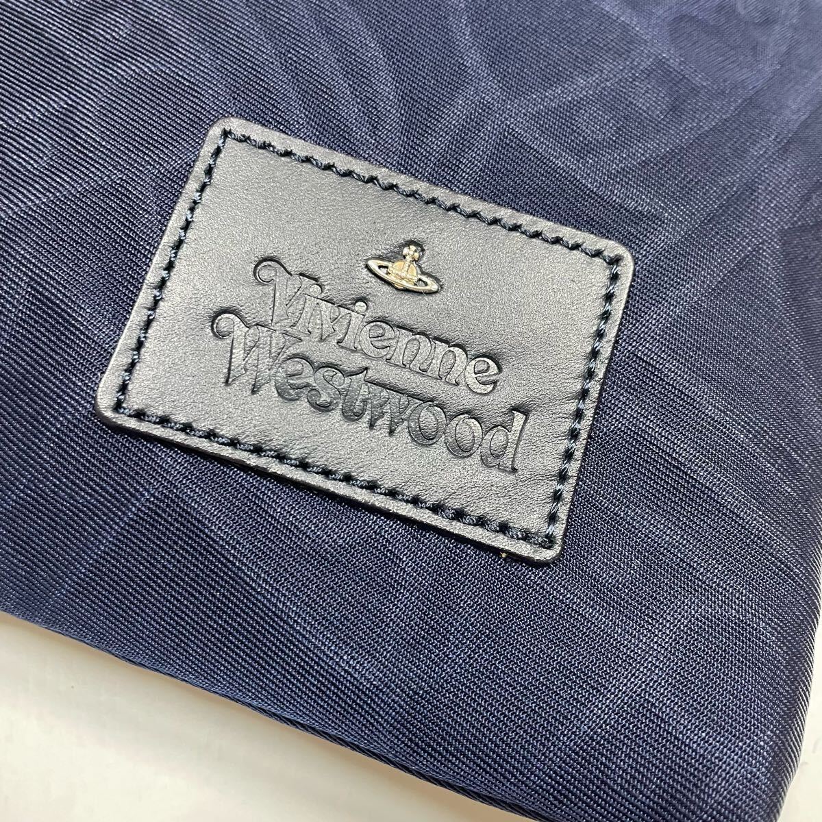  новый товар Vivienne Westwood клатч ручная сумочка линия o-ben Boss 86030/502DD