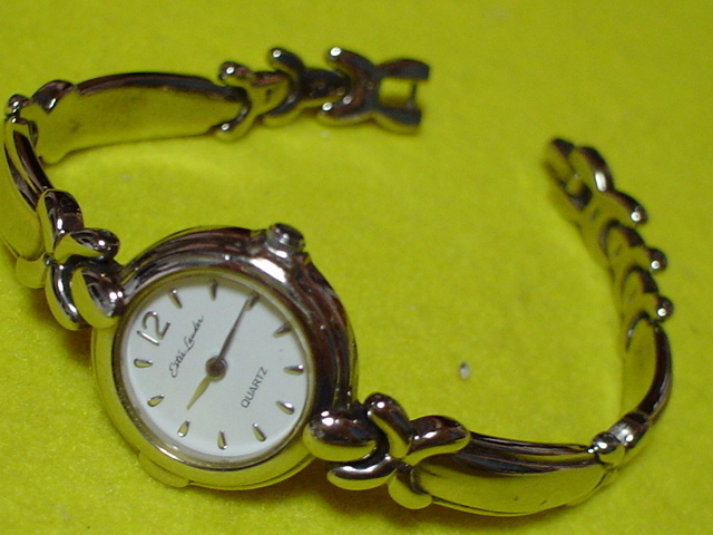 ESTEE LAUDER женский наручные часы белый тонкий JAPAN разряженная батарея 