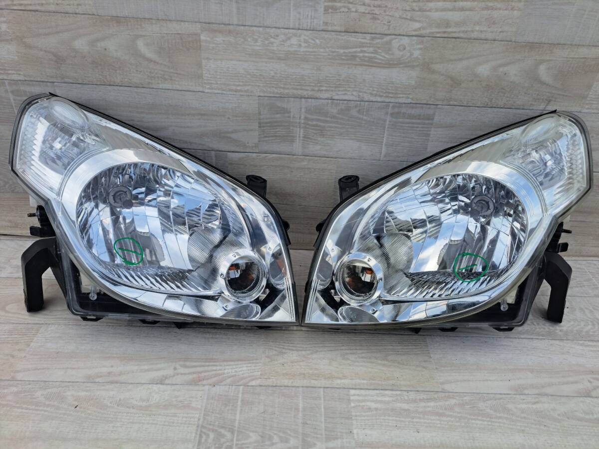 ① 日産 ラフェスタ B30 純正 ヘッドライト 左右 ヘッドランプ 左 右 レンズ ICHIKOH 1743_画像1
