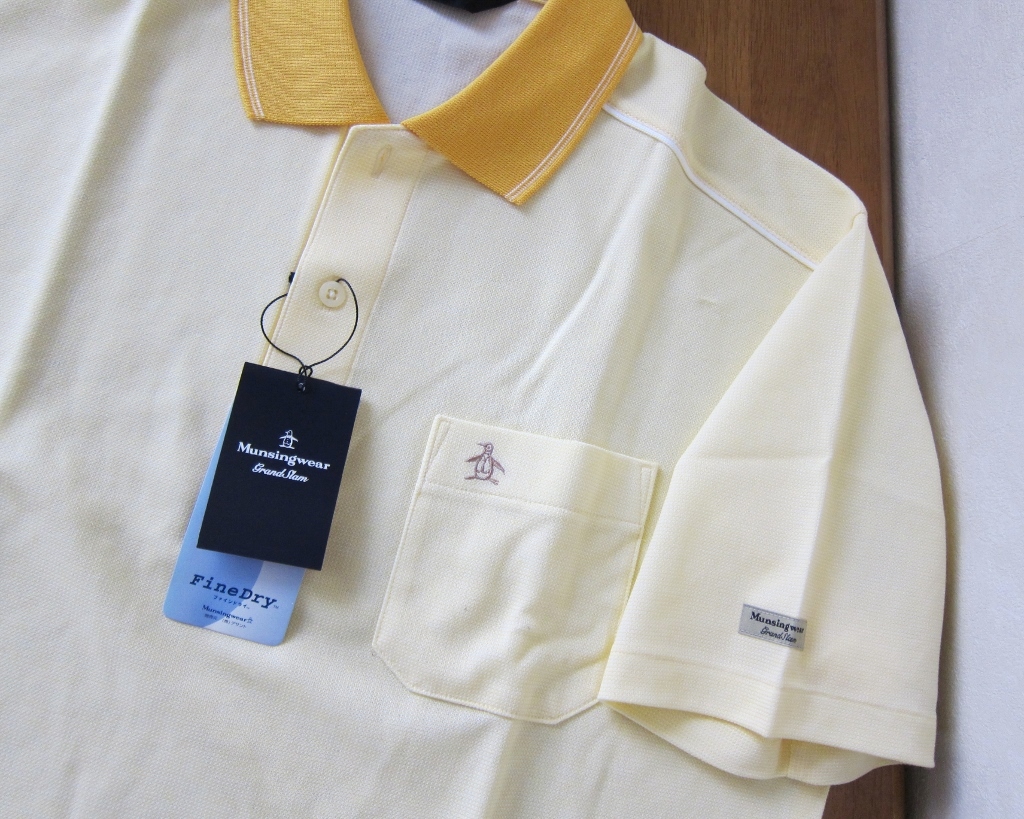 ④新品?タグ付 マンシングウェア Munsingwear 半袖ポロシャツ サイズLL 吸汗速干性 日本制 デサント クリーム×オレンジ　ゴルフウェア
