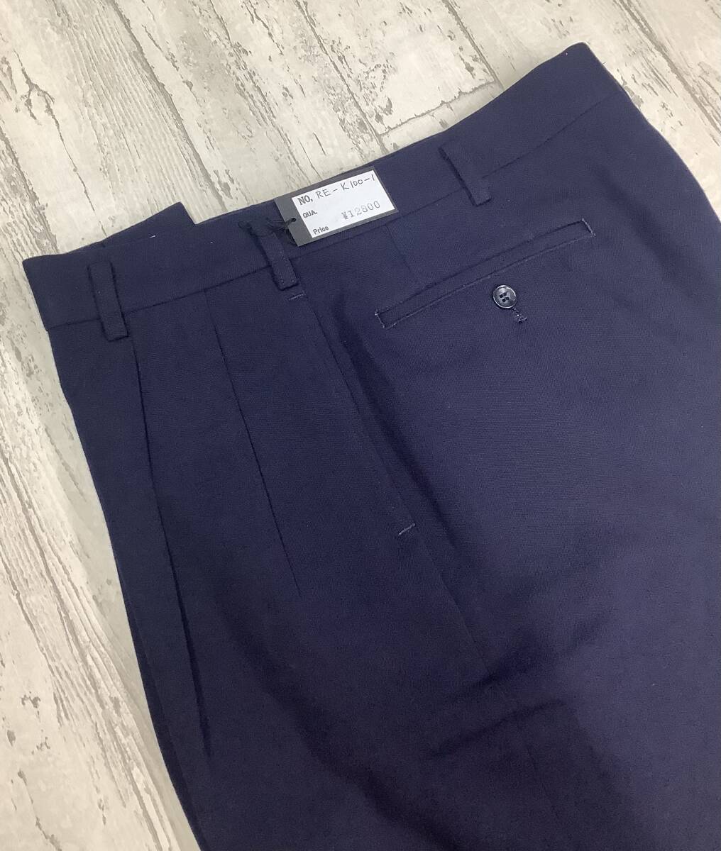 ★新品未使用★ウエスト84cm表示　定価12,800円　濃紺 ツータック　スラックスパンツ　ウール100％　