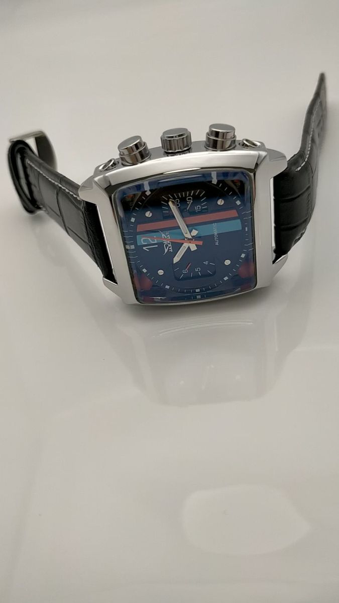 存在感が際立つ孤高のスクエアウォッチ【機械式多機能モデル/新品】バックスケルトン 自動巻き ブラック/マルチカラー文字盤/黒革
