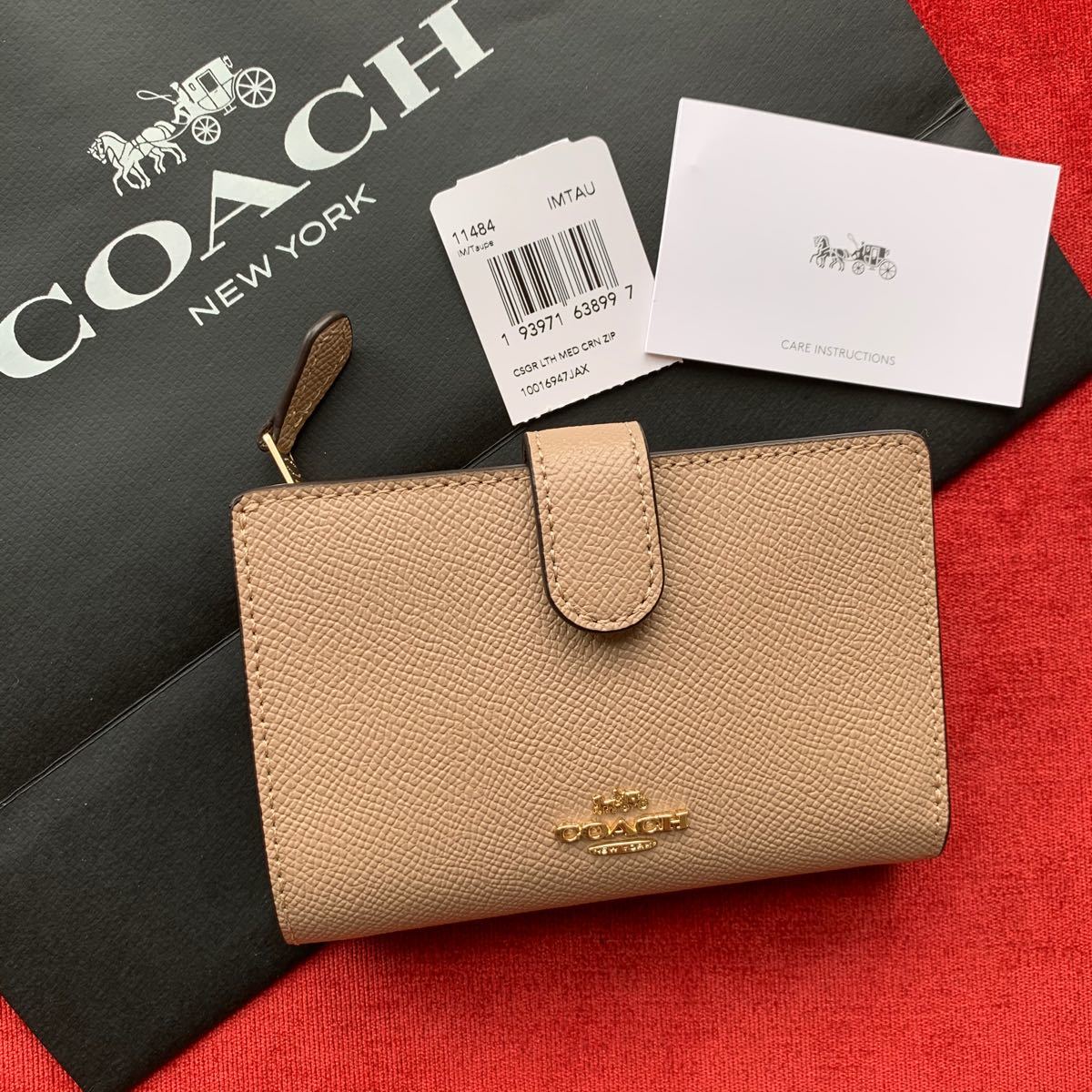 COACH 二つ折り財布 トープ グレージュ