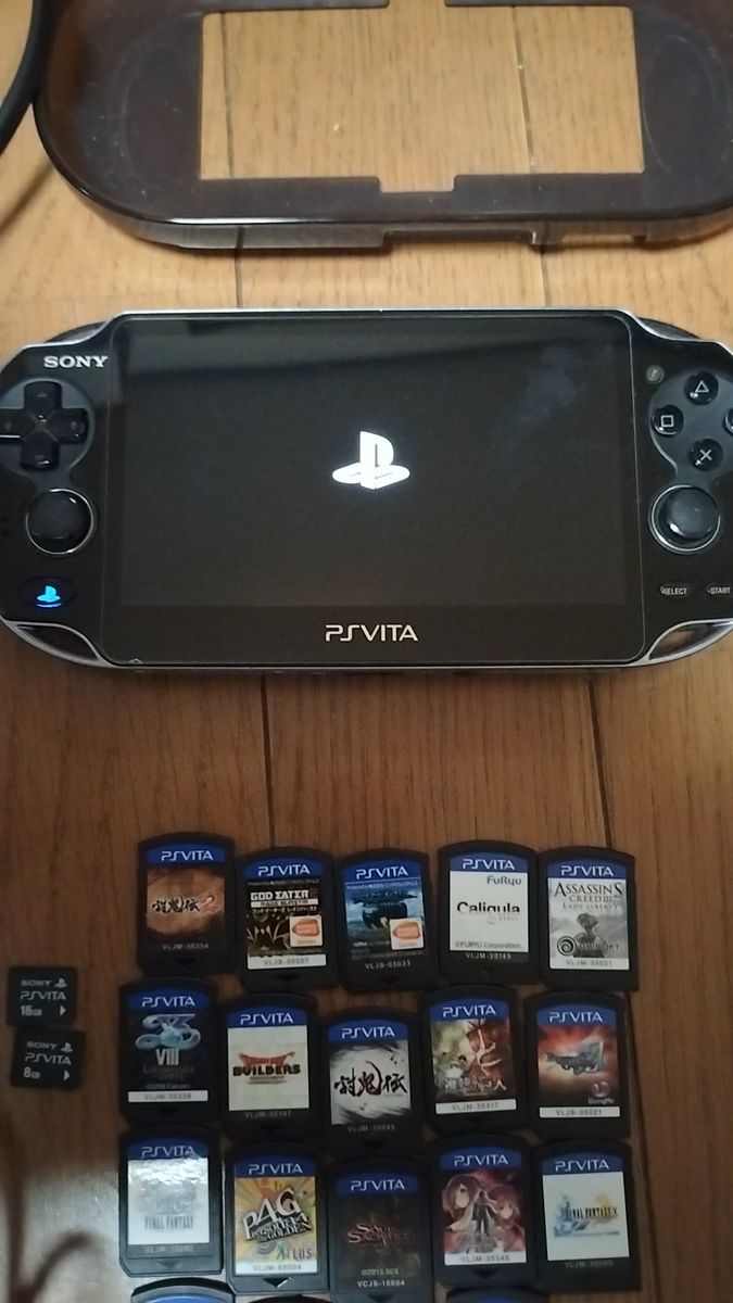 値下げ人気初期型有機ELディスプレイ PSVITA PCH-1100 大人気タイトル多数ありソフト付き・充電器セット 動作確認済み