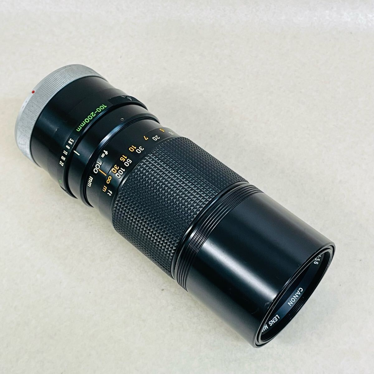 F5067/ CANON ZOOM LENS FD 100-200mm F5.6 レンズ ジャンク品