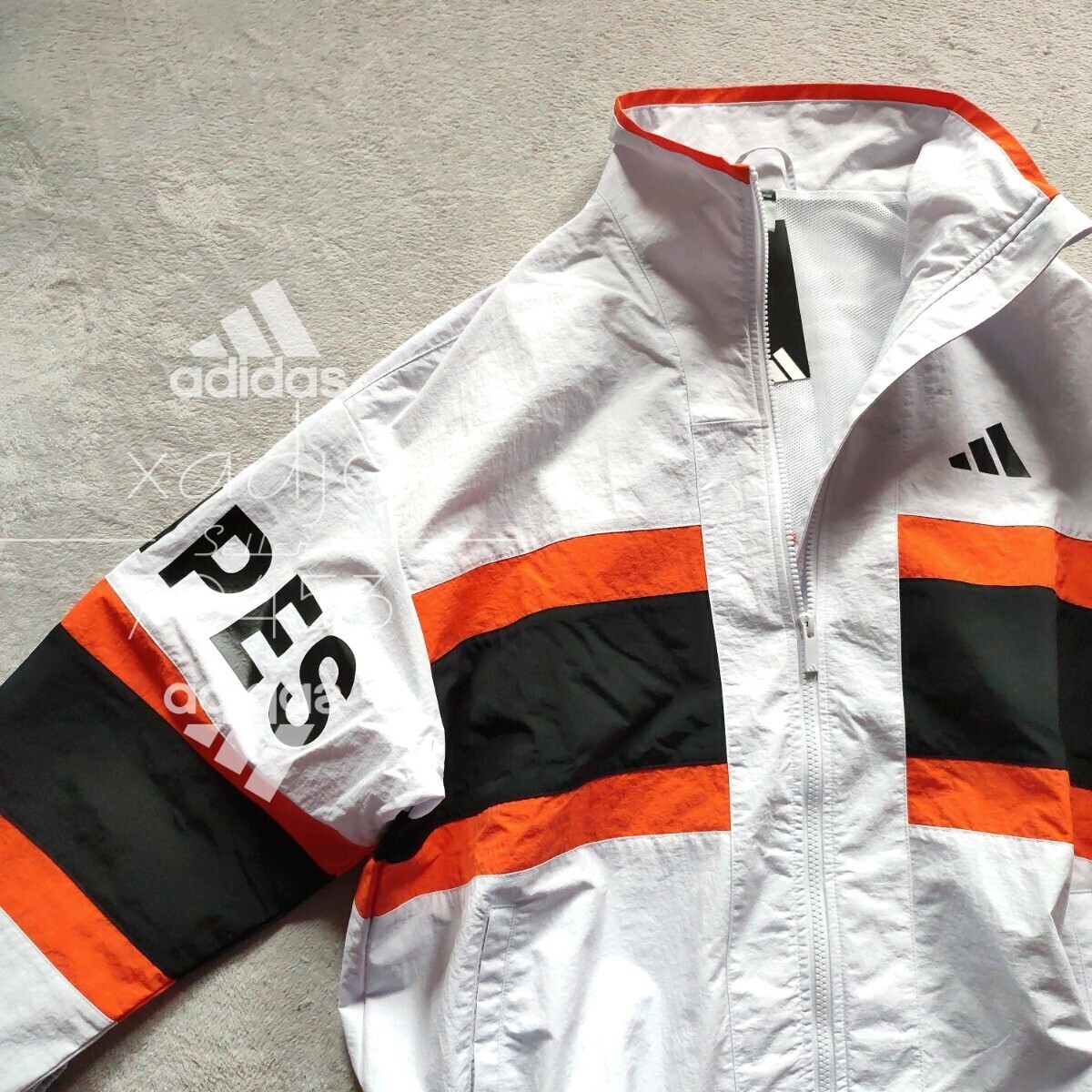 新品 正規(guī)品 adidas アディダス 上下セット ナイロン セットアップ 里地メッシュ付き 薄手 グレー オレンジ 黒 定価18040円 ゆるめ L