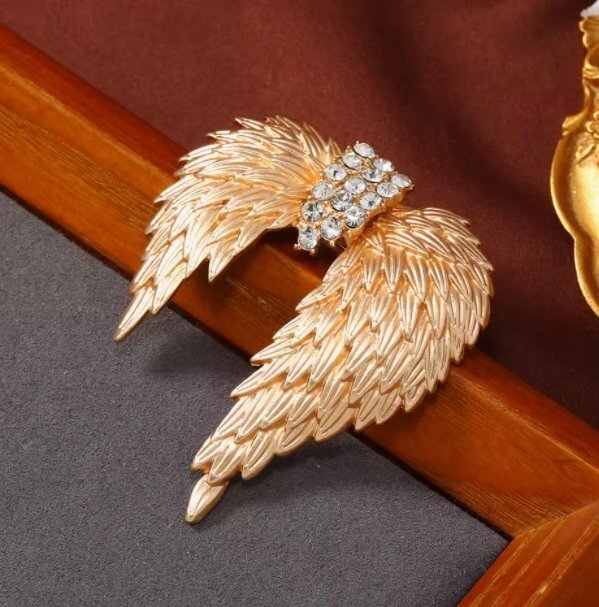  металлик чувство есть перо . Swarovski камень . орнамент .. брошь China способ атмосфера есть, коврик . золотой цвет ангел перо букет булавка брошь 1.0