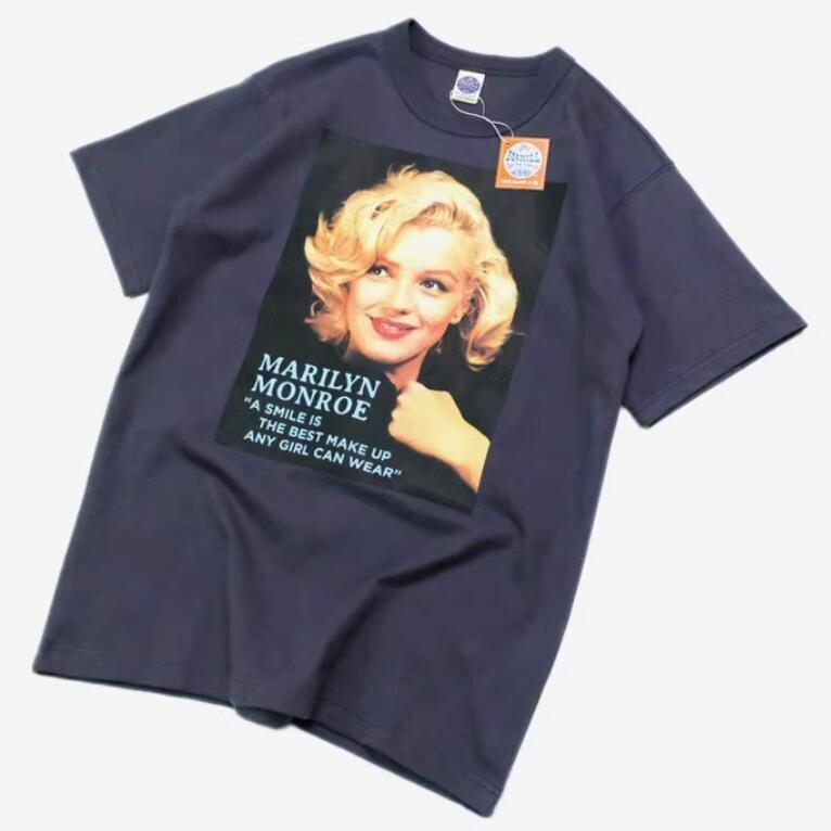 TOYS McCOY トイズマッコイ 半袖Tシャツ TMC2313 “A SMILE IS THE BEST MAKE UP”マリリンモンロー TEE ネイビーグレー S