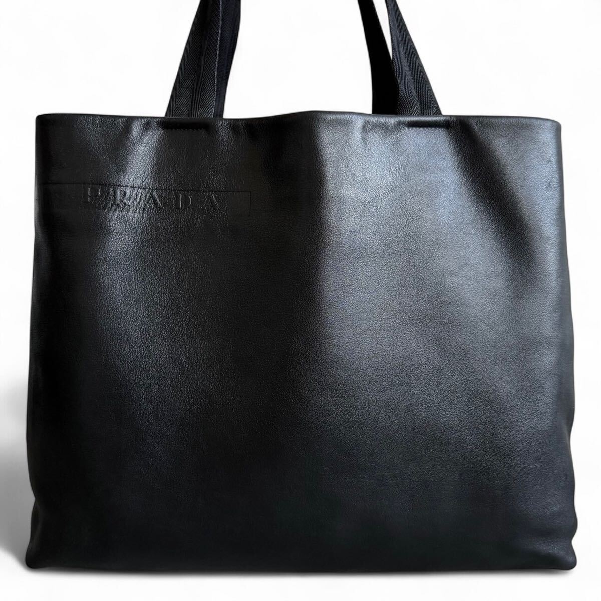 極美品/A4可●PRADA プラダ メンズ トートバッグ ビジネス ハンドバッグ 肩掛け 大容量 書(shū)類(lèi)鞄 オールレザー 本革 ロゴ型押し ブラック 黒