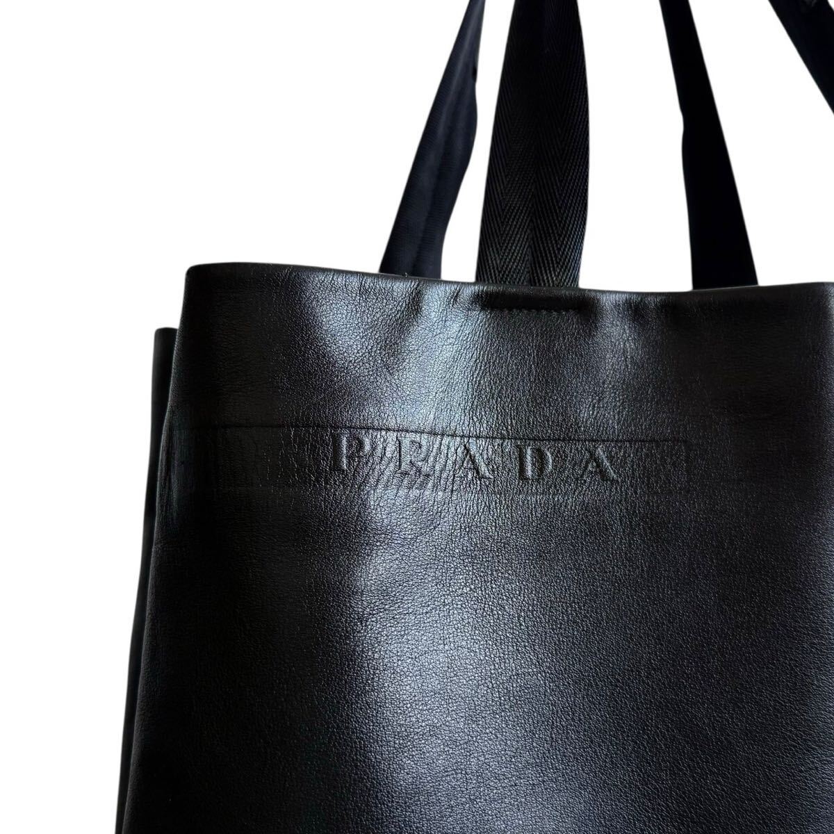 極美品/A4可●PRADA プラダ メンズ トートバッグ ビジネス ハンドバッグ 肩掛け 大容量 書(shū)類(lèi)鞄 オールレザー 本革 ロゴ型押し ブラック 黒