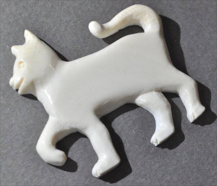 ナンタケットバスケット用のマンモス牙のねこのオーナメント