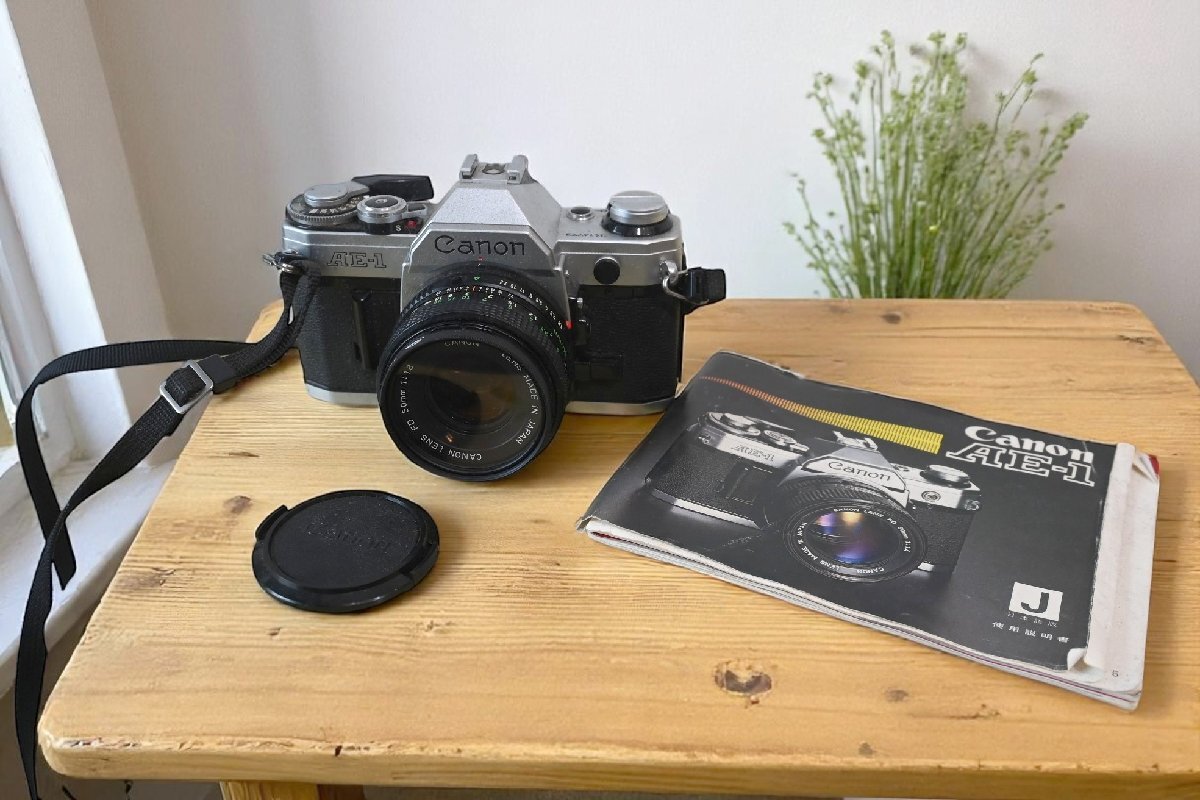 ○CANON/キヤノンAE-1　一眼レフカメラ　50ｍｍｆ1.8 古道具のgplus広島 2506ｋ
