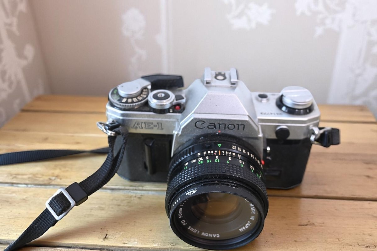 ○CANON/キヤノンAE-1　一眼レフカメラ　50ｍｍｆ1.8 古道具のgplus広島 2506ｋ