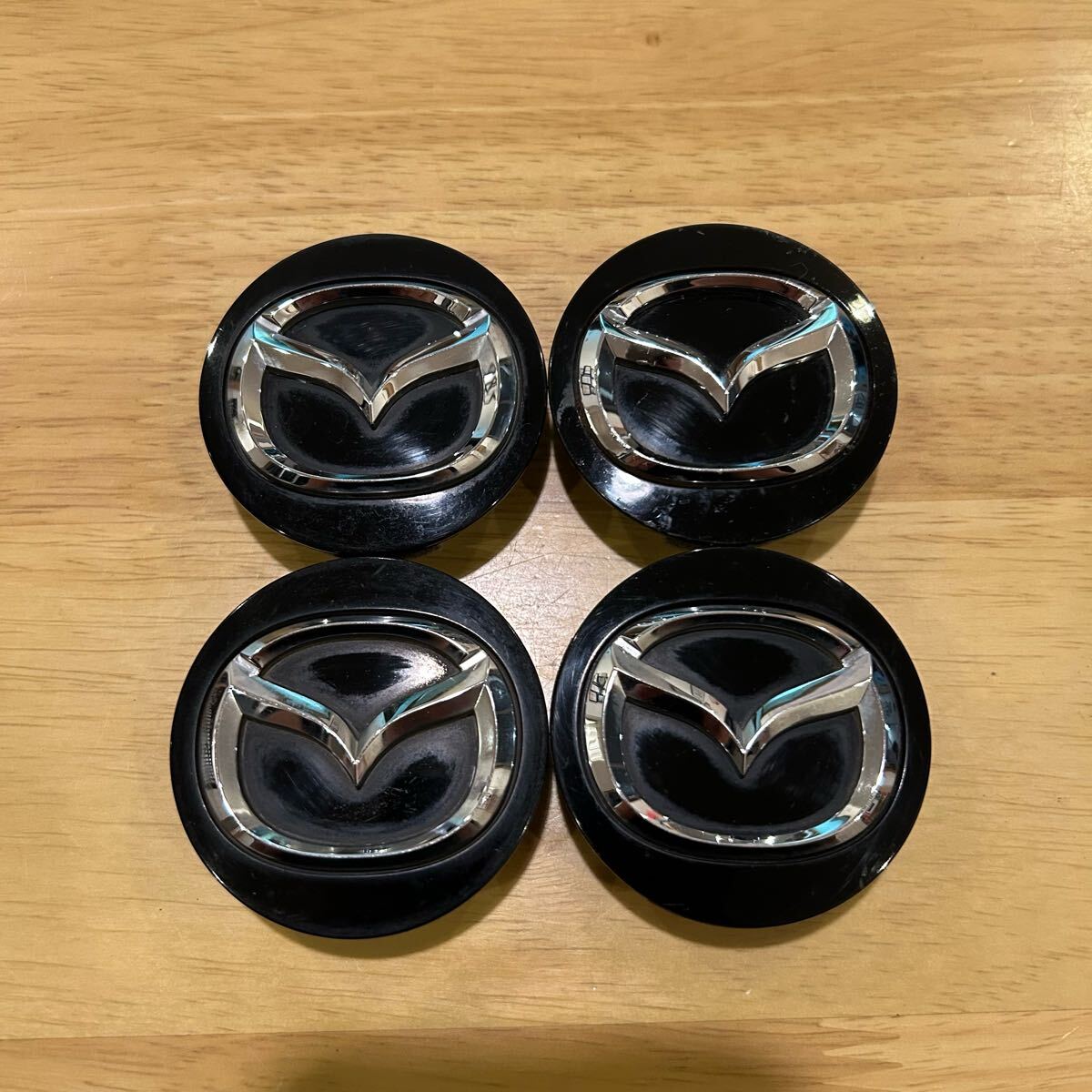 M310 マツダ 純正 センターキャップ 4個 外径57mm 黒 ブラック_画像1