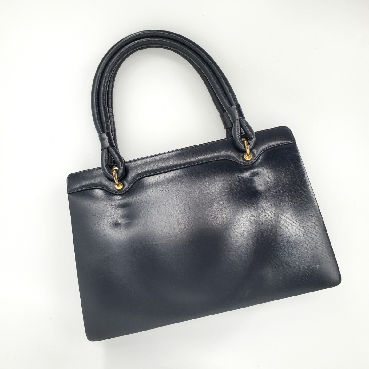 ＊b 【上品なデザイン】ヴォルテッラ Volterra レザー ゴールド金具 がま口 3層 ハンドバッグ 手提げ カバン 紺 ネイビー
