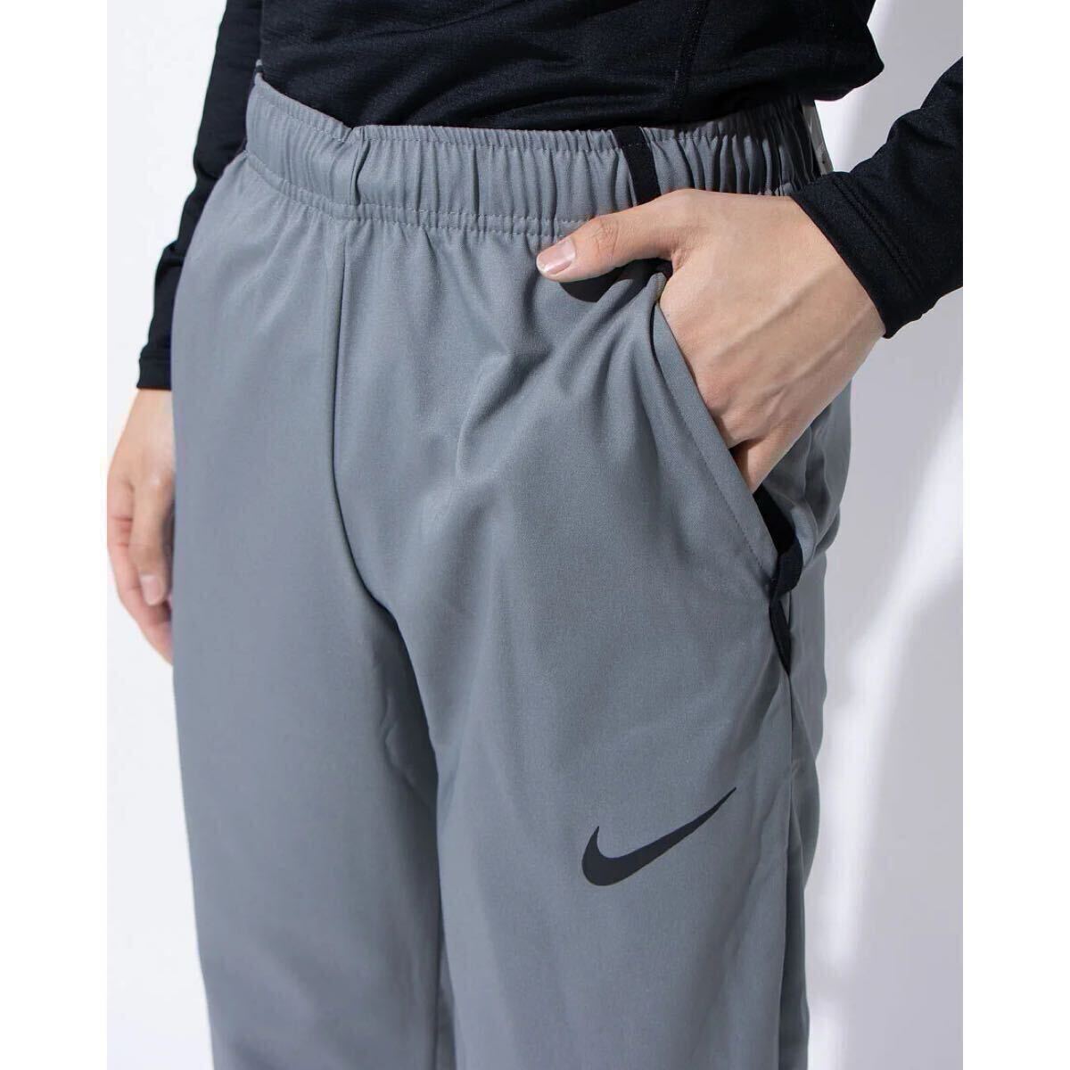 格安送料 2XLサイズ 新品 NIKE ナイキ ウーブンパンツ ドライフィット トレーニング ランニング スポーツウェア グレー XXL 3L CU4958-084