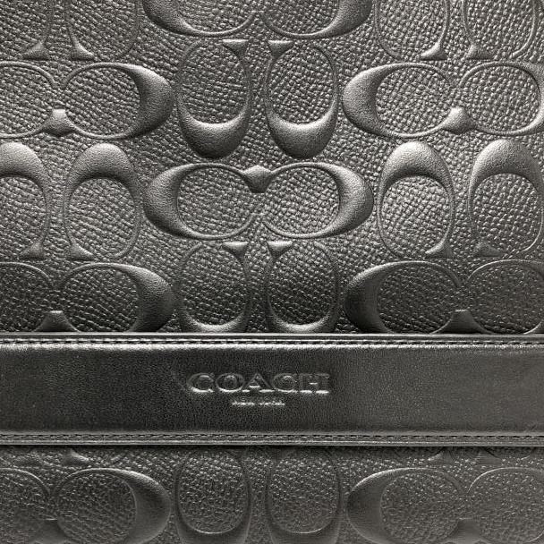 【中古】COACH シグネチャー エンボスドクラッチバッグ F75914 ブラック[240024517036]