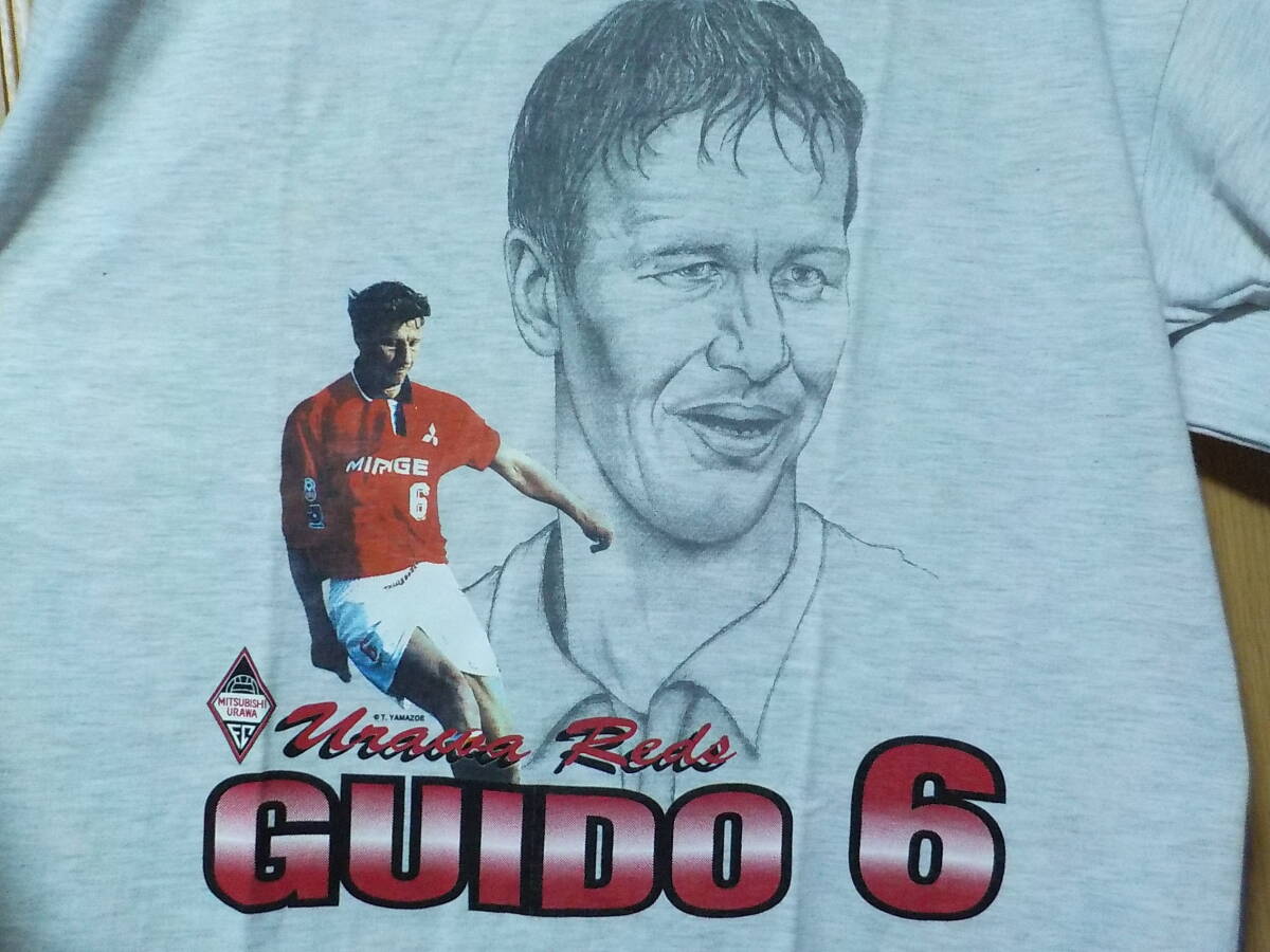 90s 紙タグ付未使用 汚れ有【即決 送料無料】NUTMEG 浦和レッズ 1997 ブッフバルト Tシャツ L Guido Buchwald ユニフォーム Jリーグ 642-5
