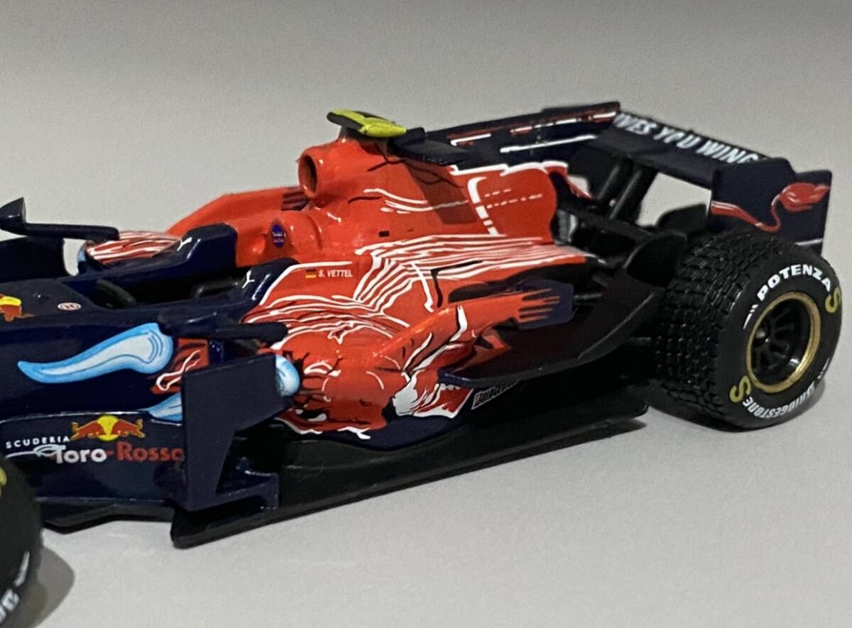 1/43 F1 Scuderia Toro Rosso Ferrari STR3 Sebastian Vettel #15 ◆ Winner 2008 Formula 1 Italian Grand Prix Monza ◆ Red Bull