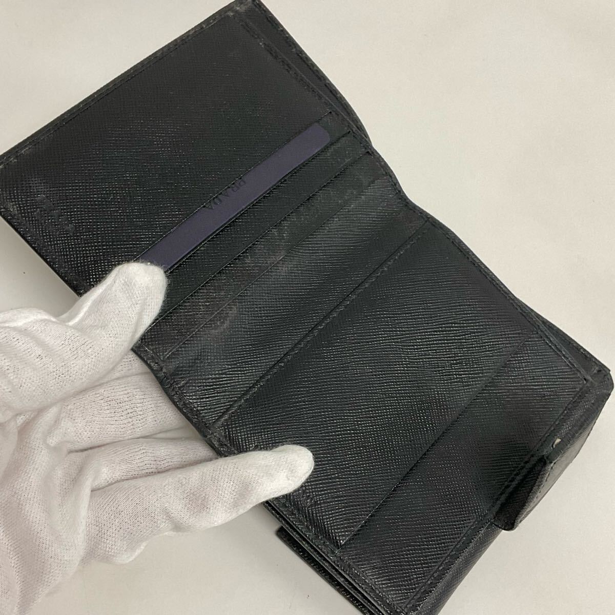 D679-60◆ PRADA プラダ M523A ブラック サフィアーノ レザー 三角ロゴプレート財布 ケースあり