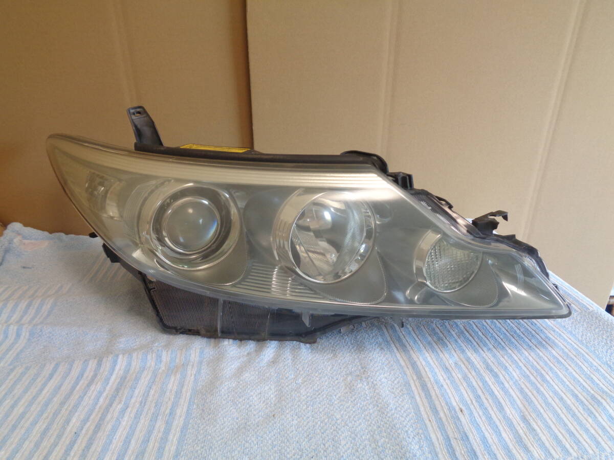 限定送料込み　エスティマ　HV　AHR20　右ヘッドライト　HID　関西以東地区送料無料　KOITO　28-212　印字80_画像1
