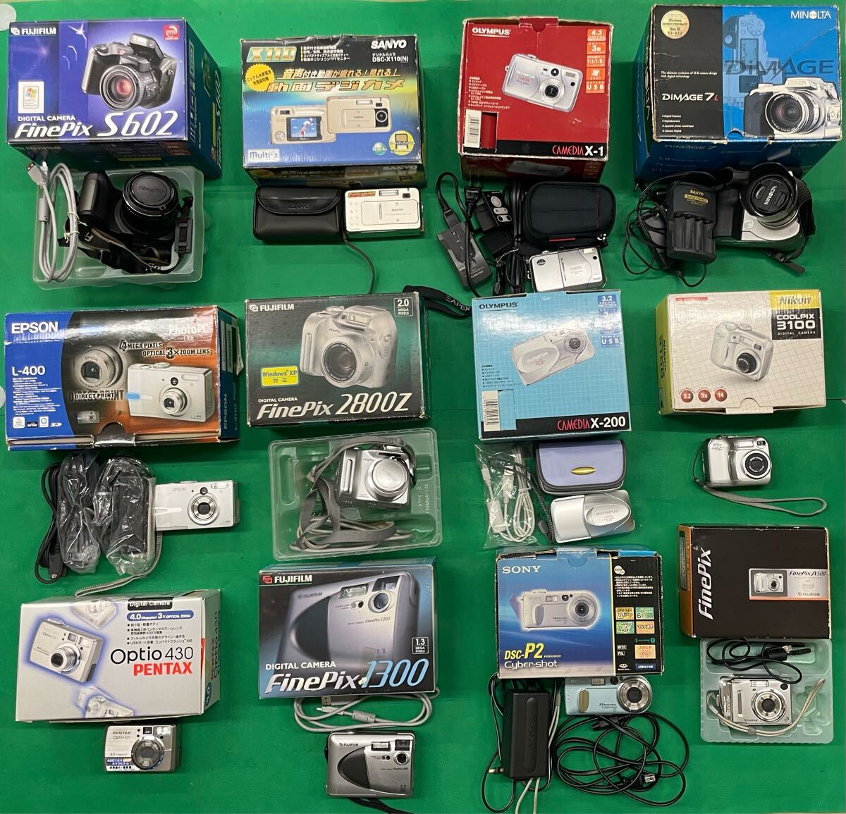 （E129）12個 デジタルカメラ まとめ売り SONY Nikon FUJIFILM OLYMPUS など ジャンク 動作未確認 元箱付き 含充電器付き 
