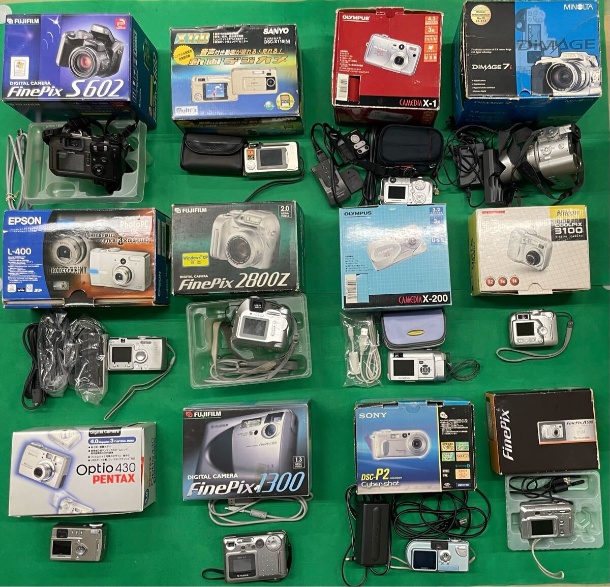 （E129）12個 デジタルカメラ まとめ売り SONY Nikon FUJIFILM OLYMPUS など ジャンク 動作未確認 元箱付き 含充電器付き 