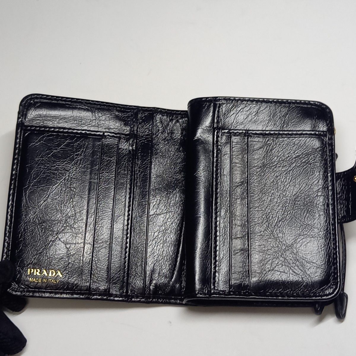 注目の新作♪【PRADA】コンパクトサブレ スカート 美品 PRADA プラダ 新作 ソフトルックスレザー財布 ブラック