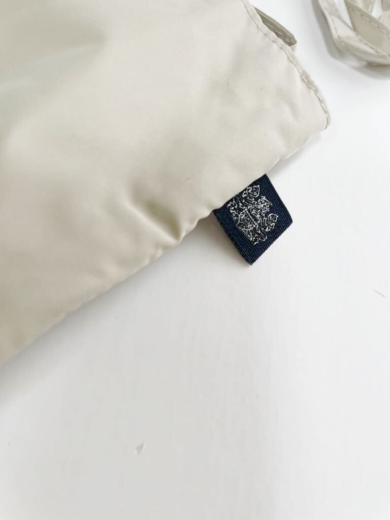  новый товар Aquascutum плащ непромокаемая одежда упаковочный пакет есть L размер тренчкот 