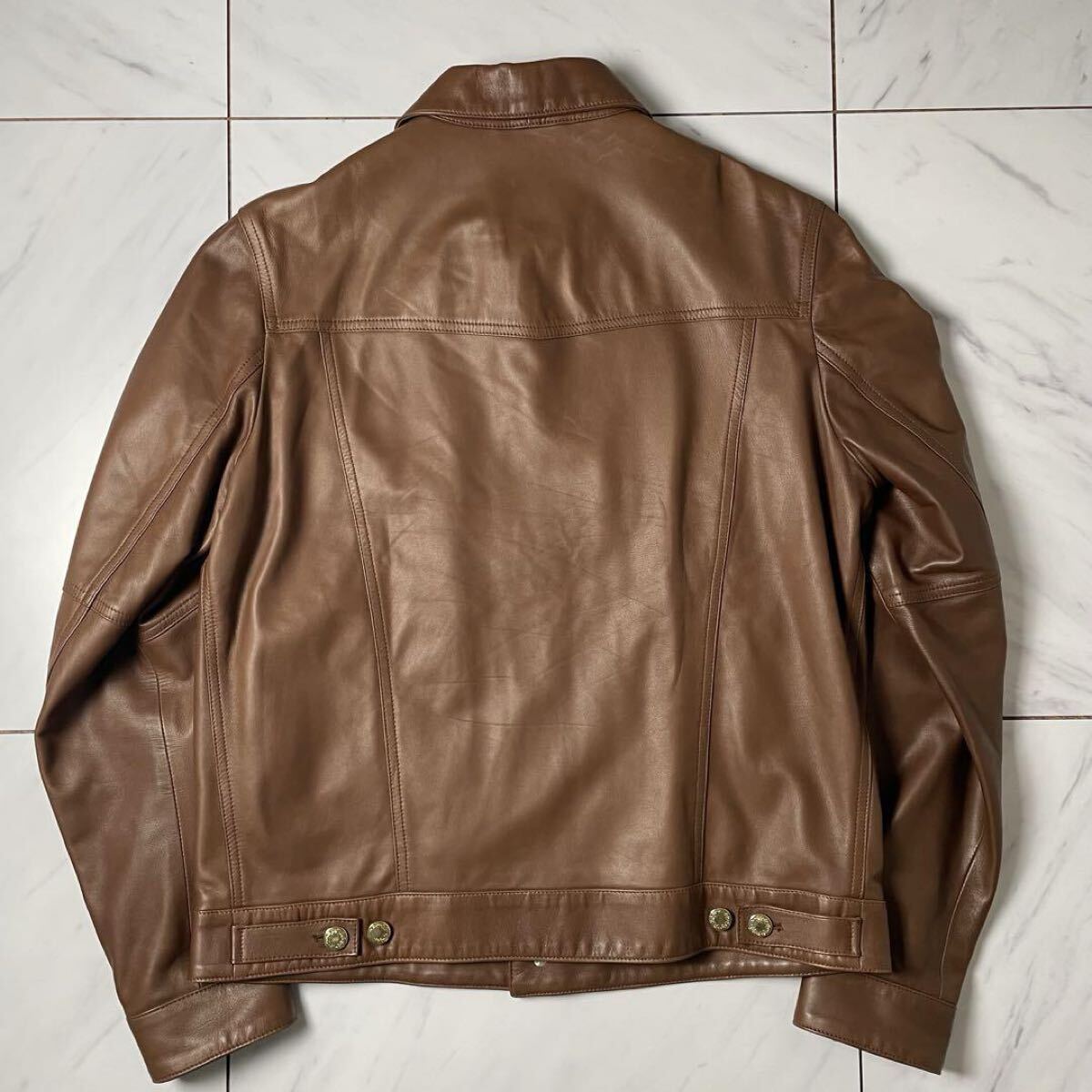 美品 EMMETI レザー トラッカージャケット 羊革 ラムスキン 金