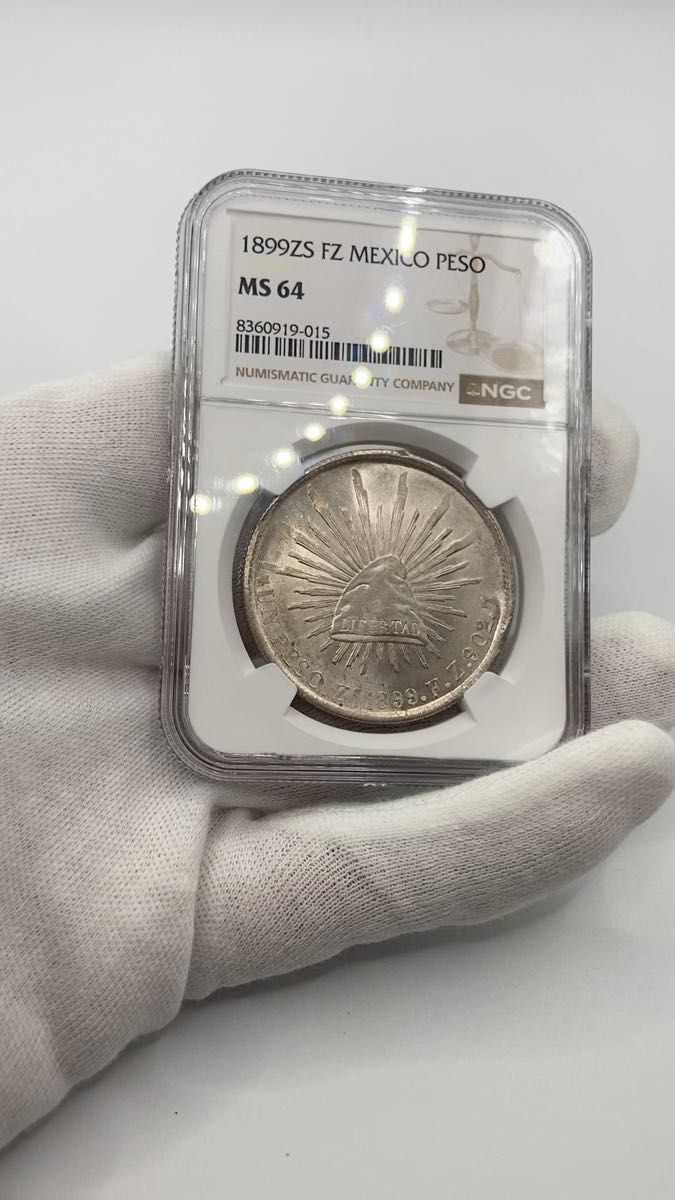 【高鑑定】メキシコ 1ペソ銀貨 1899 ZS FZ NGC MS64 古銭 アンティークコイン 貿易銀