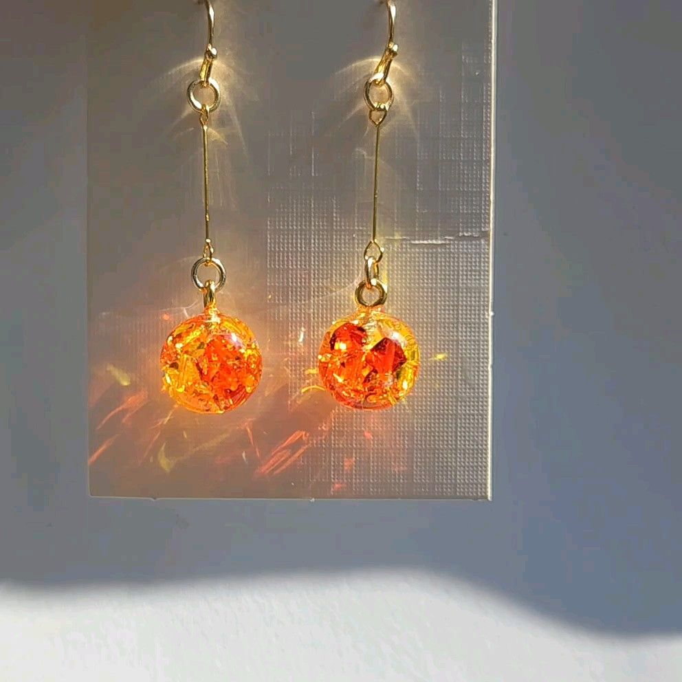 マリーゴールド スワロフスキー レジン ピアス イヤリング