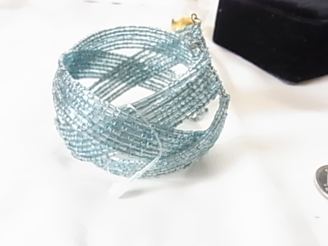  unused new goods .. seems to be . Sky blue color light blue empty color Kirakira lustre feeling exist beads. compilation included width approximately 4.5 centimeter bangle bracele **