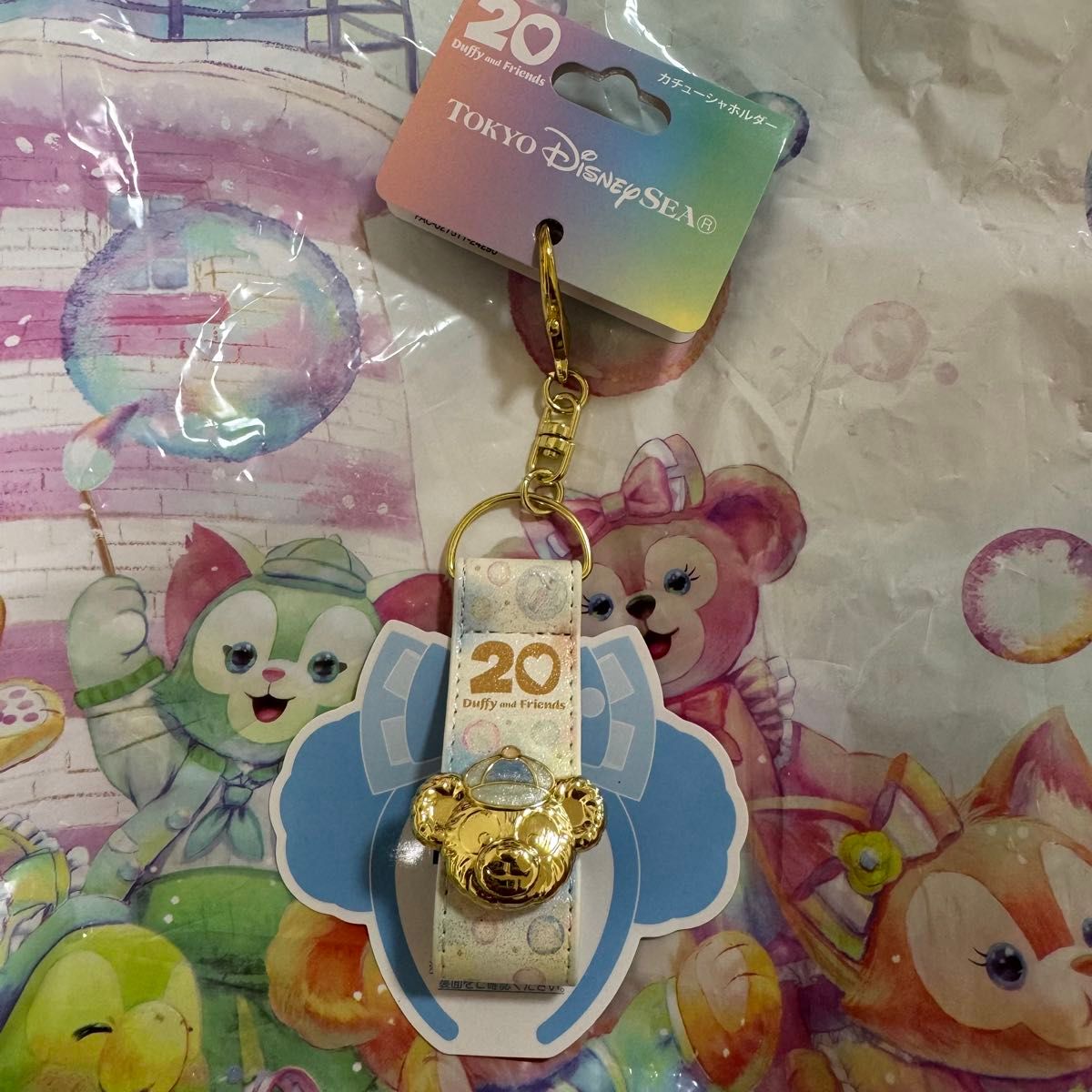 ダッフィー20周年 カラフルハピネス トートバッグ、カチューシャホルダー ダッフィーフレンズ20周年 カラフルハピネス カチューシャ