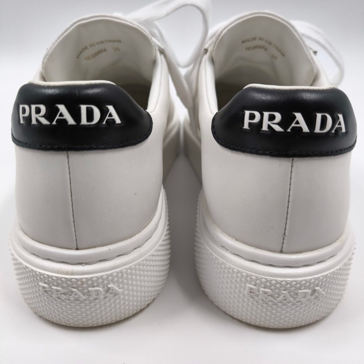 PRADA ロコエンホスレスアッフスニカ 4E3400FG000Z5O F0379ECRU 極美品【PRADA プラダ】ローカットスニーカー 36 レザー 白