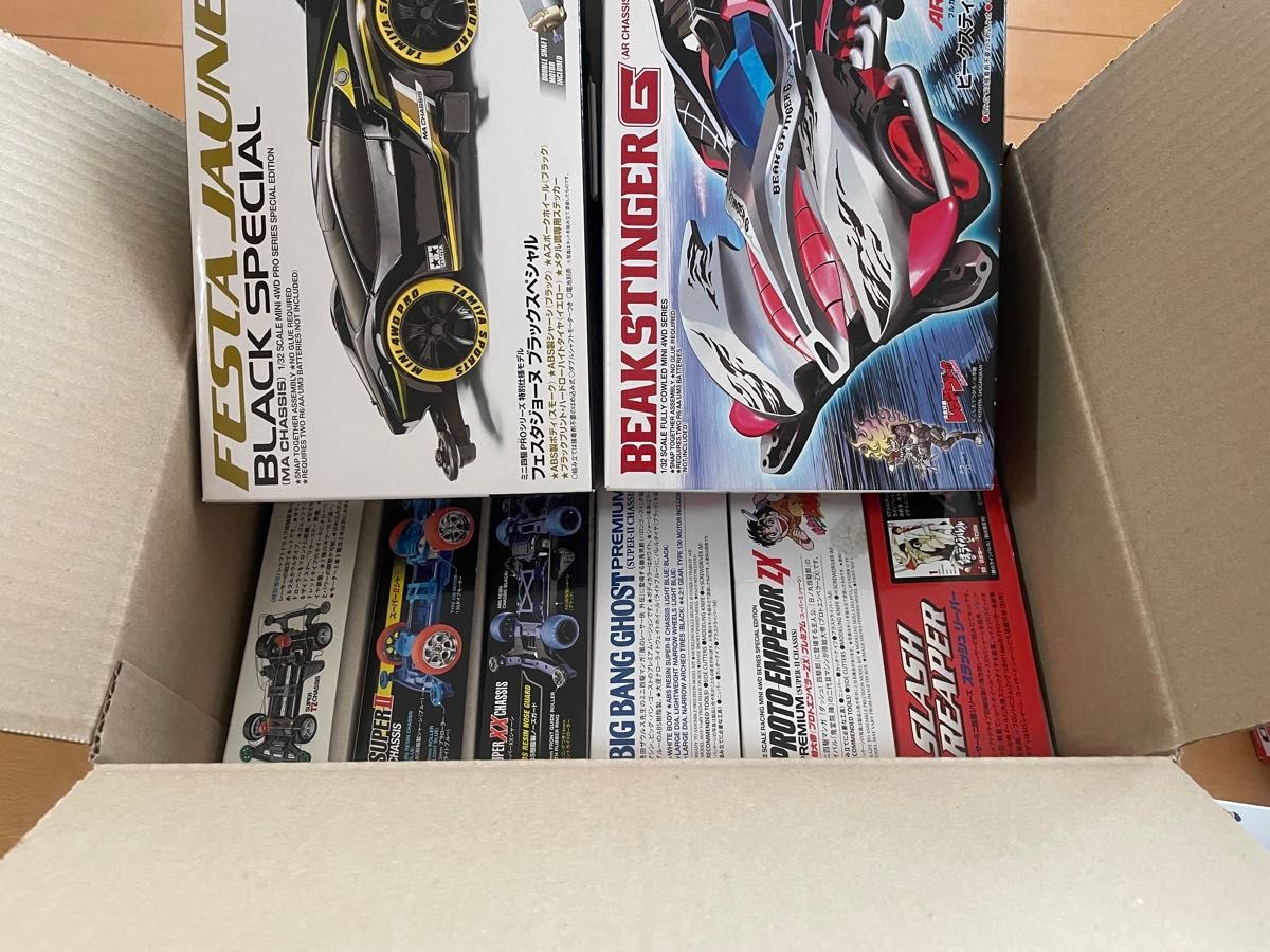 包装紙です ミニ四駆 8個セット売り ジャンク品 ミキシングによる不揃い品