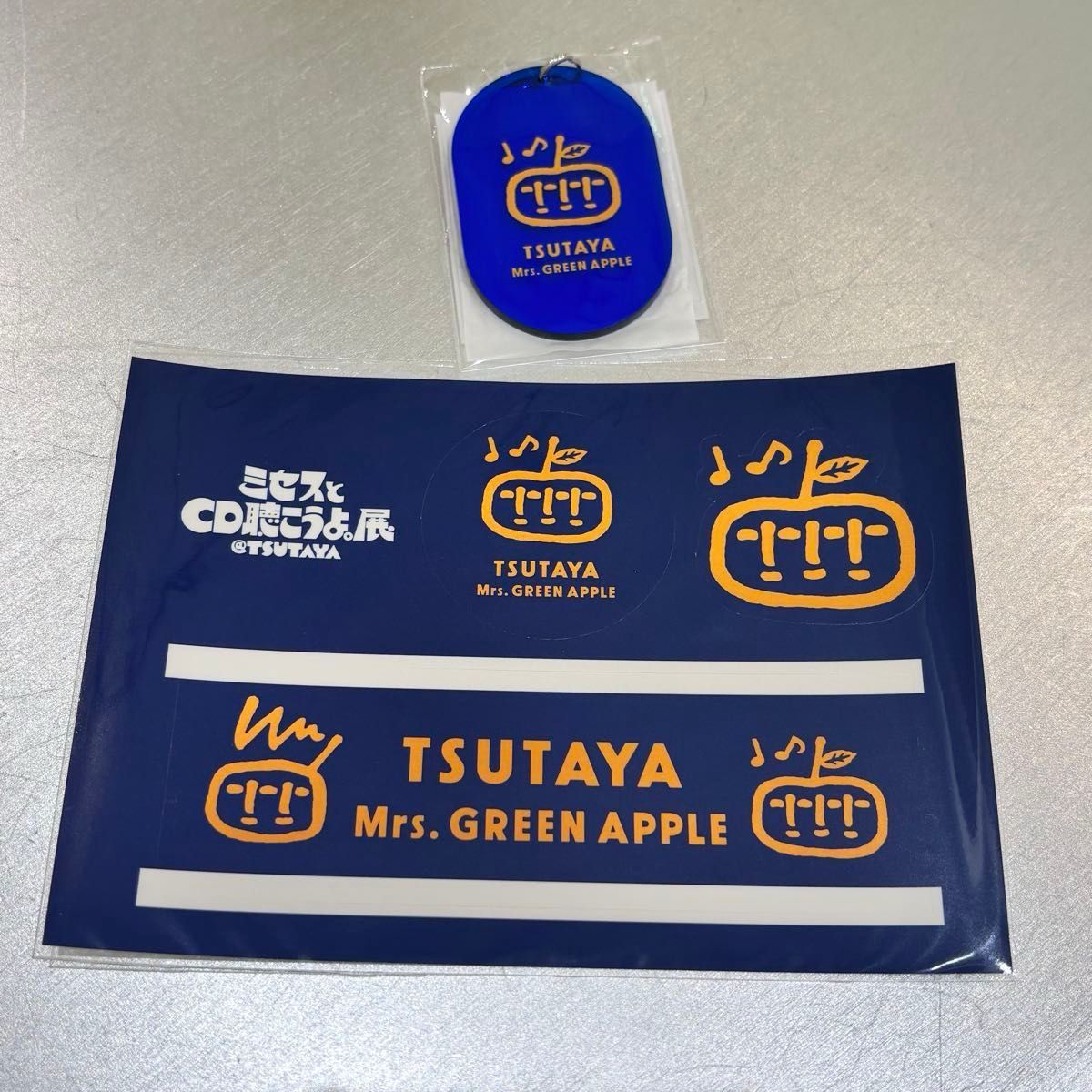 TSUTAYA ミセスとCD聞こうよ。展 ポーチ・キーホルダー・ステッカー SHIBUYA TSUTAYA Mrs GREEN APPLE ミセスとCD聴こうよ 展 限定